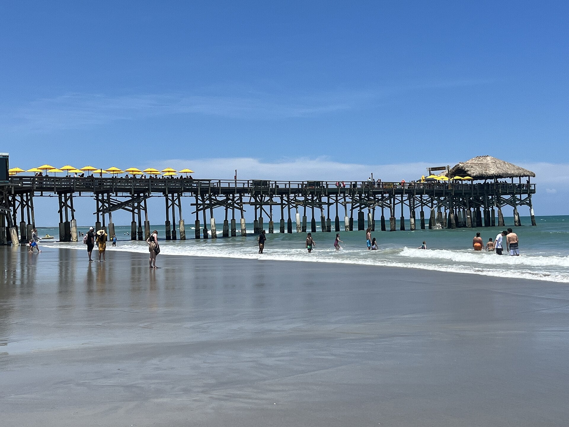 The Cocoa Beach Pier and swimmers on Florida's Space Coast