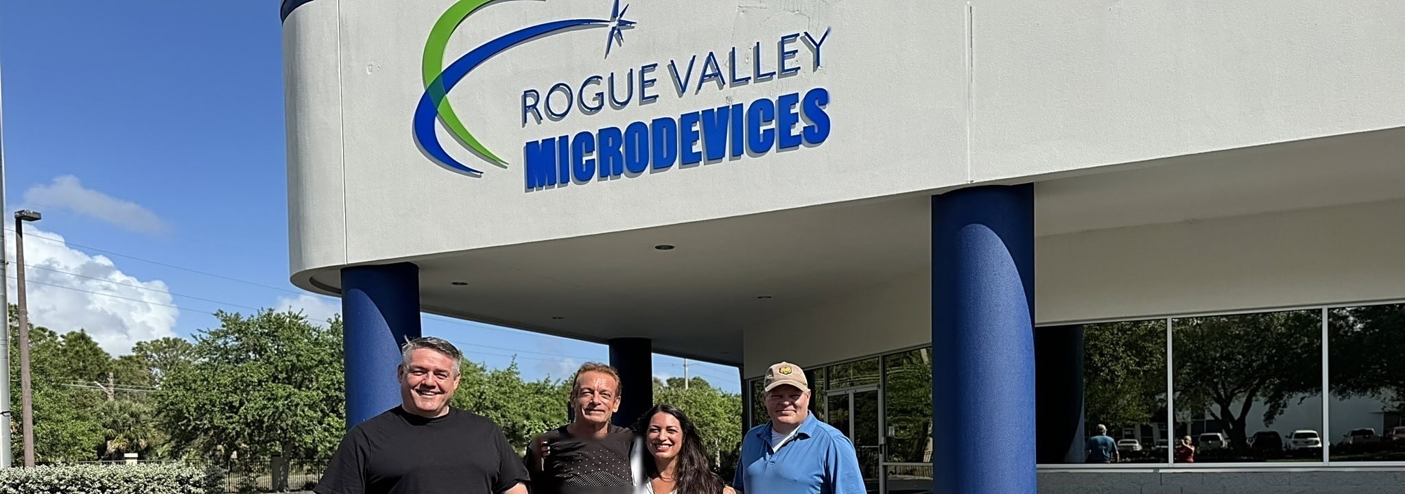 The Rogue Valley Microdevices team outside the company facility