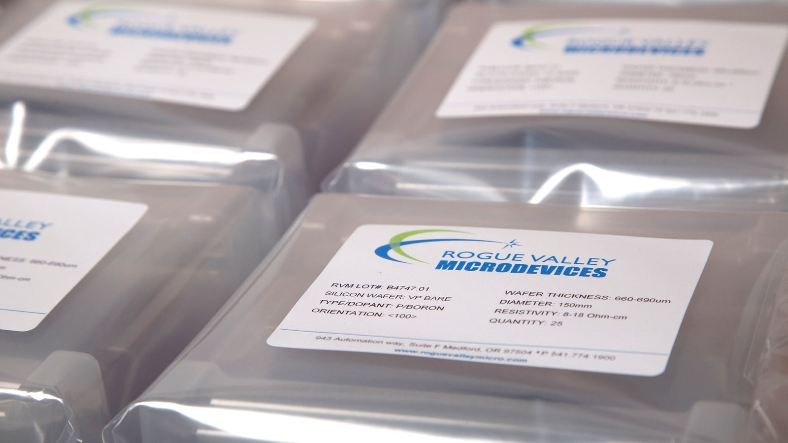 Labeled Rogue Valley Microdevices wafer lots sealed and ready to ship